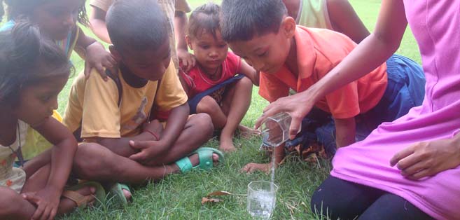 MAGIC IN THE CLASSROOM: Children at Éclair Ludhiana marveling at the raised coin in the glass of water as part of their basic science class